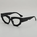 Onregelmatige dikke zwarte cat-eye zonnebril met dik geometrisch frame en UV-bescherming - Zwart Frame Heldere Lenzen