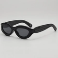 Occhiali da sole cat-eye neri alla moda con montatura ondulata spessa e lenti scure - Montatura Nera Lenti Grigie