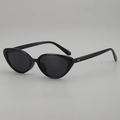 Classic black cat eye sunglasses with silver metal dots and retro minimalist style - Sunglasses / Black Frame Grey Lens