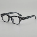 Retro square camouflage glasses frame with four metal rivets in a 45-degree angle view - Floral Frame