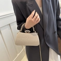 Elegant champagne gold evening clutch with crown rhinestone buckle and glittery finish - Gold