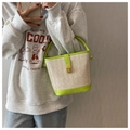 Contrast lime green and cream straw woven bucket bag with leather handle and gold twist lock - Green