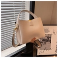Minimalist beige pebble leather handbag with gold hardware and wide shoulder strap - White