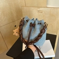 Blue denim bucket bag with brown woven handle and cute plush bear charm decoration - Light Blue