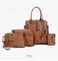 Detail of 4-piece caramel brown leopard print handbag set with graffiti lettering and charms - Yellow