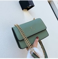Dark green crossbody bag with gold deer head emblem and metal chain strap in leather texture - Green