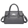 Borsa a tracolla grigia con stampa coccodrillo, manico intrecciato e chiusura argento - Grigio