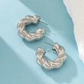Silver-tone croissant hoop earrings with textured rope design and polished finish - Twisted C-Shape Silver