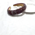 Macro detail of deep purple crystal beaded padded headband with non-slip fabric lining - Deep purple