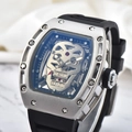 Men's silver tonneau watch featuring a hollow skull dial and black silicone strap - Silver-Black