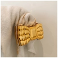 Golden bow-shaped acrylic evening bag with geometric facets and rhinestone handle - Gold