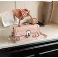 Pink faux crocodile leather crossbody bag with silver twist lock and adjustable strap - Pink