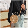 Handwoven straw round bag with pearl handle and dried floral accents for summer vacation - Khaki