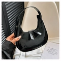 Minimalist black patent leather dumpling bag with glossy finish and silver hardware - Black