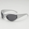 Y2K punk style wrap-around sunglasses with silver frames and dark oval lenses - One Size / Silver Frame Grey Lens