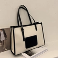 Minimalist large capacity tote bag in black and white contrast faux leather with stitching - Black