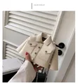 Detail of creative cream white jacket-shaped shoulder bag with silver metal chain strap - White