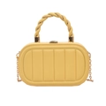 Vue détaillée du sac boîte jaune avec coutures verticales et poignée torsadée - Jaune