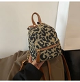 Mini leopard print backpack for women featuring brown leather straps and gold zippers - Brown