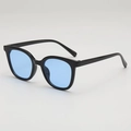 Retro square sunglasses with thick black frames and ocean blue lenses shown in a 45-degree angle - Black Frame Blue Lens