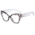 Occhiali cat-eye tartarugati con stanghette azzurre su sfondo bianco - Montatura Demi Aste Blu