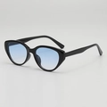 Retro cat-eye sunglasses with glossy black frames and blue gradient lenses for women - Black Frame Progressive Blue