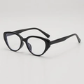 Retro black cat-eye sunglasses with glossy plastic frames and high UV protection - Black Frame Clear Lenses