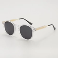 Moderne transparente Harzsonnenbrille mit dunkelgrauen Rundgläsern und Goldmetalldetails - Transparenter Rahmen Graue Gläser