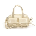 Creamy white Boston handbag featuring front flap pockets and leather bow decoration - Off White