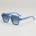 Modern translucent blue square frame sunglasses with gradient grey lenses in 45-degree view - Blue Frame Gradient Green Lens