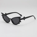 Polygonal bat shaped sunglasses in glossy black finish for Halloween cosplay - Black Frame Black Grey Lens
