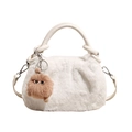 Cute white faux fur handbag with monster charm and leather handle in a minimalist style - White (521-1124) / White