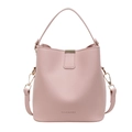 Pink minimalist bucket bag in smooth leather finish with top handle and crossbody strap - Pink