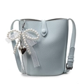 Light blue bucket bag with litchi grain faux leather and pearl bow charm - Blue