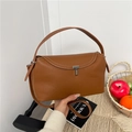 Lindy style caramel brown pebbled leather handbag with white contrast stitching and silver lock - Brown