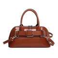Caramel crocodile-embossed leather top handle shell bag with belt buckle and crossbody strap - Brown