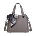 Fashionable taupe crossbody bag with litchi grain leather and decorative silk scarf - Gray
