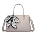 Chic pebbled leather handbag in light grey featuring decorative floral scarf and strap - Gray