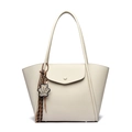 Chic beige textured leather tote bag with a leopard bear charm and woven tassel - Beige