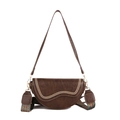 Vintage brown saddle bag in synthetic leather featuring unique wave-patterned stitching - Brown