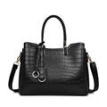 Elegant black crocodile-embossed tote bag with gold hardware and removable shoulder strap - Black