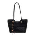 Black vintage shoulder tote bag with tassel charm and textured patchwork leather design - Black