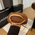 Brown woven evening clutch bag with a large gold metal buckle and elegant chain strap - Brown