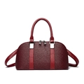 Minimalist burgundy woven leather handbag with dual handles and silver metallic hardware - Burgundy