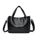 Bolso tote clásico de cuero negro granulado con detalles metálicos en color plateado - Negro