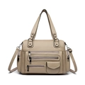 Versatile beige multi-pocket moto satchel in pebbled leather for women with crossbody strap - Khaki