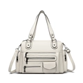 White pebbled leather multi-pocket motorcycle bag with silver hardware and shoulder strap - White