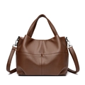 Classic brown pebble leather tote bag with dual top handles and silver crossbody strap - Brown
