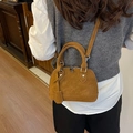 Classic brown shell shaped handbag in matte leather with top handles and shoulder strap - S / Brown