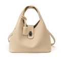 Minimalistische beige Beuteltasche aus Leder mit silbernem Drehverschluss und Griffen - Schwarz